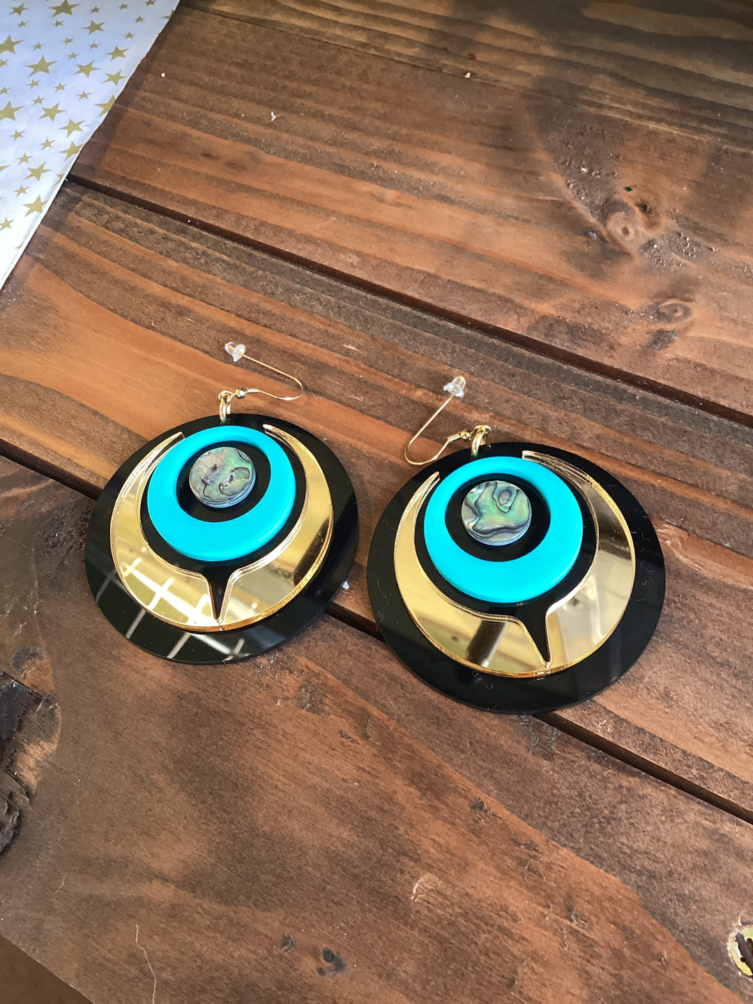 Copper canoe woman oval abalone shell earrings