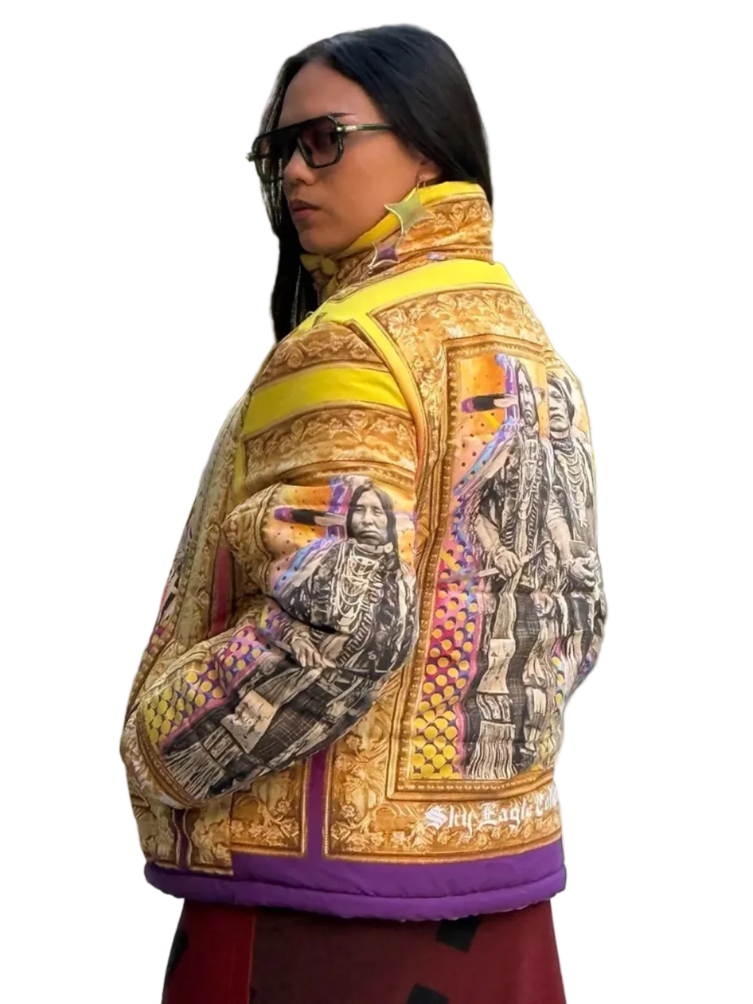 Person wearing a colorful jacket with Native American intricate designs on a white background