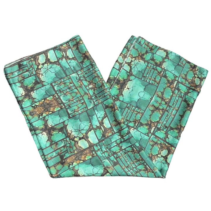 Native Turquoise patterned scarf on a white background