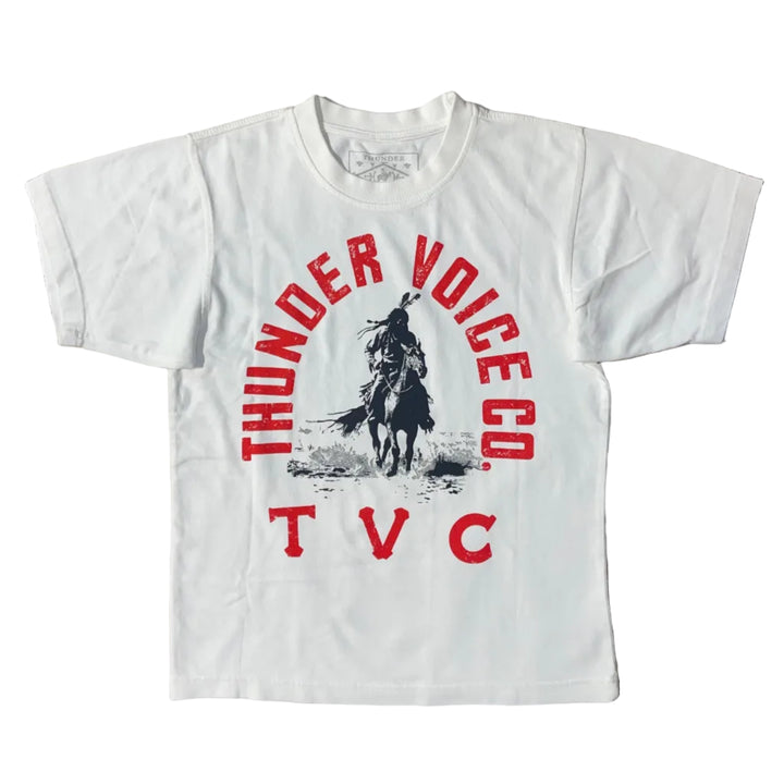 White Native American t-shirt with red text and graphic on a patterned surface on white background