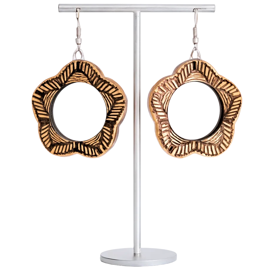 Pair of wooden hoop earrings on a white background