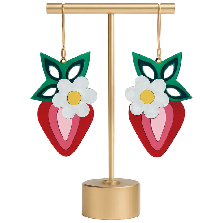Colorful strawberry-shaped earrings with floral designs on a gold stand against a white background